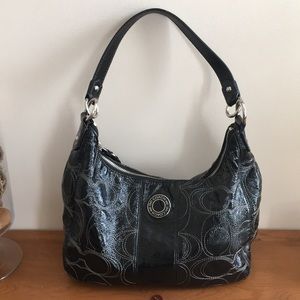 Coach black patent leather hobo bag.